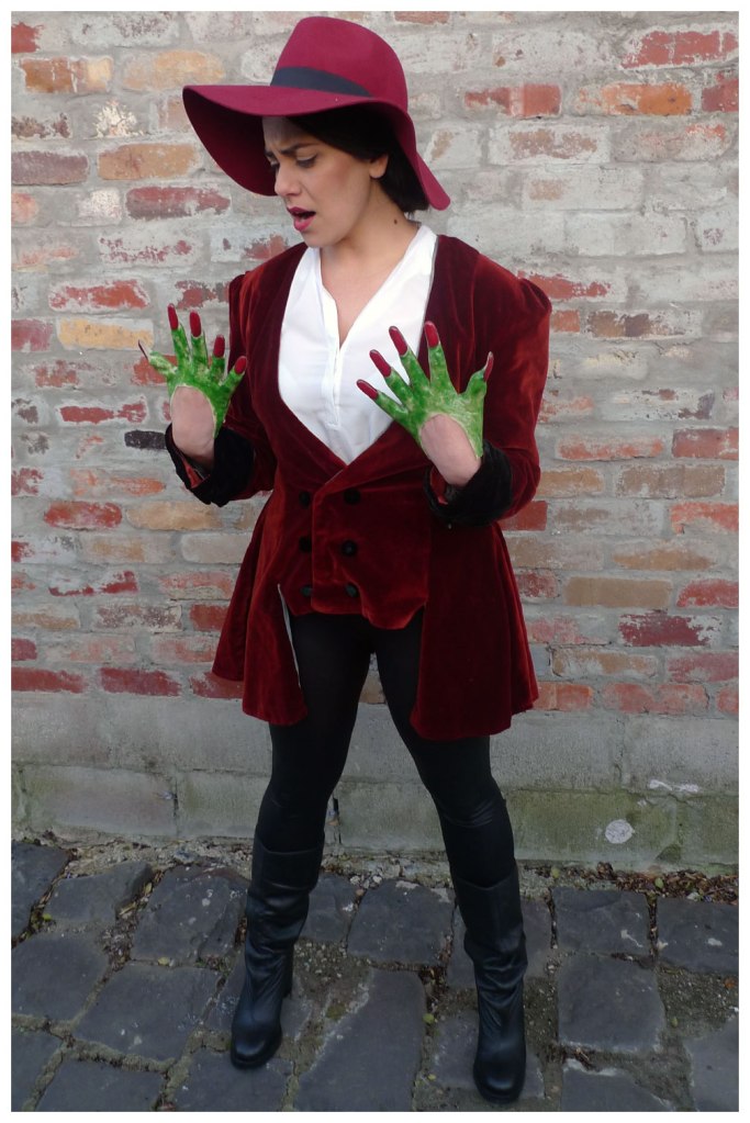 Theodora turning into the Wicked Witch of the West Costume